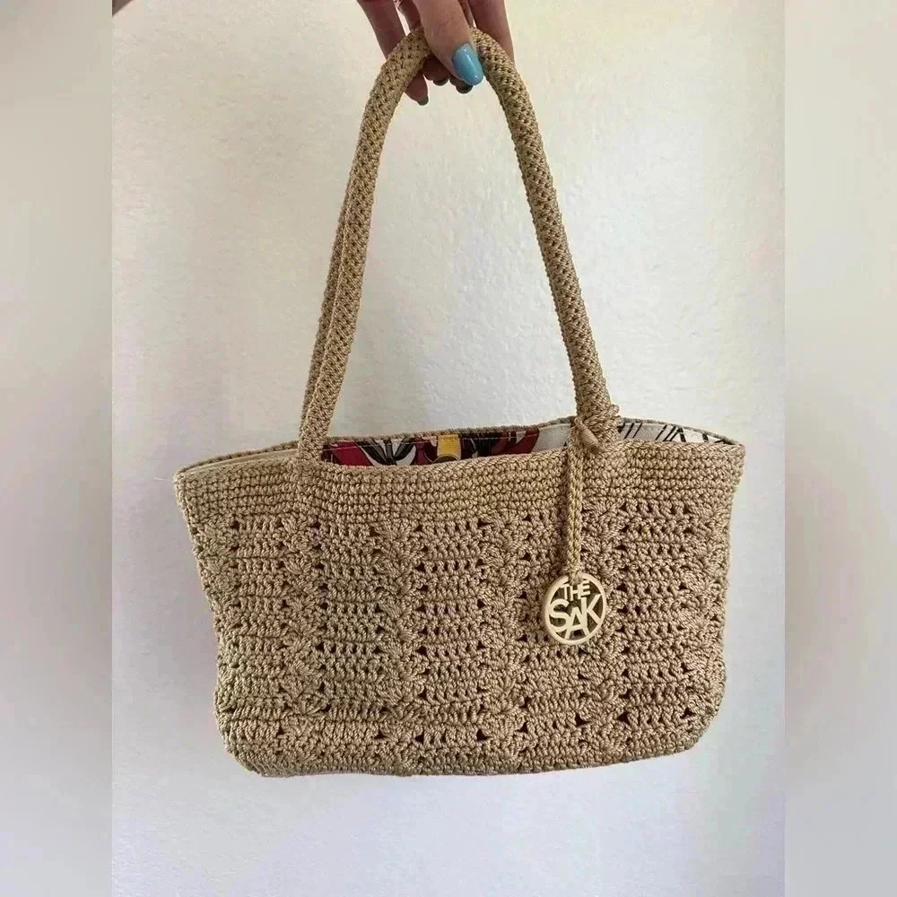 The Sak Tan Crochet Tote with Logo Charm